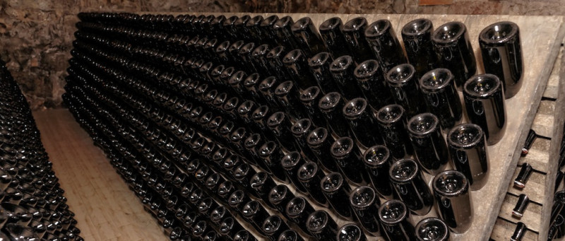bigstock-Riddling-rack-used-for-ageing-78627887.jpg